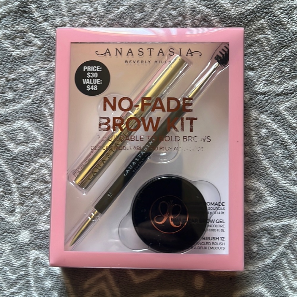 Anastasia brow pomade with brow brush and brow gel in ebony color.